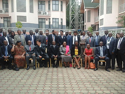 Members of the EABC in a group photo. They called for removal of bottlenecks to trade. (Peterson Tumwebaze)