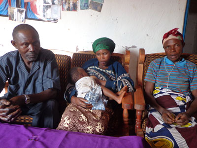 Yankurije (C), her mother-in-law (R) and father during the interview. The families exemplify the ideals of reconciliation. (Jean de la Croix Tabaro)