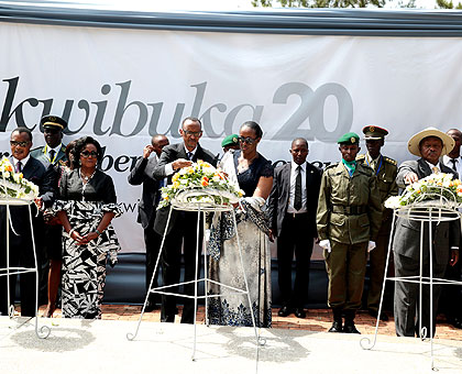 President Kagame and First Lady Jeannette along with the President of the Republic of Congo, Denis Sassou Nguesso and his wife (L), and President Museveni of Uganda lay wreaths ....