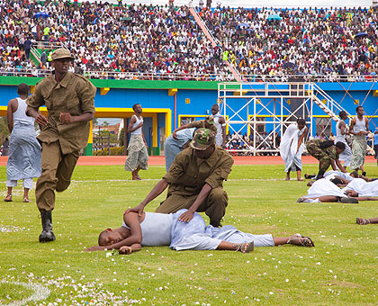 Artistes dramatise u2018Shadows of Memoryu2019, a skit depicting the 1994 Genocide against the Tutsi. (Timothy Kisambira)