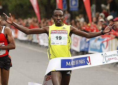 Rwanda's veteran long-distane runner Dieudonne Disi crosses the finish line after winning the Paris half Marathon two years ago. File