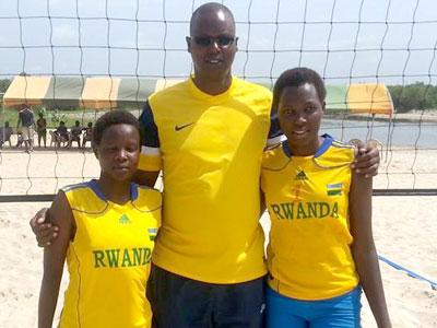 Paul Bitok with his girls: Su00e9raphine Mukantambara and Lu00e9a Uwimbabazi. (Courtesy)