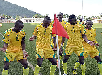 AS Kigali players celebrate Rodrigue Murengezi's (#7) goal against Ahly Al-Shendi at Stade de Kigali in the last round. File.