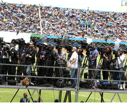 Journalists cover the 20th commemoration event at Amahoro Stadium last week. Timothy Kisambira.