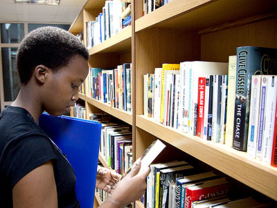 A student reading a book in the Kigali Public Library. (Timothy Kisambira)