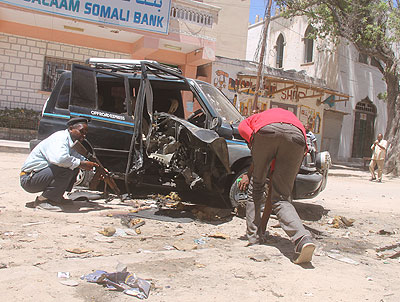 The wreckage of a vehicle that exploded in Mogadishu, killing Isak Mohamed Ali, a Somali lawmaker. Unknown gunmen shot dead a Somali lawmaker on Tuesday, making the deceased the se....