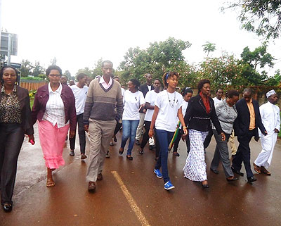 Mourners walk in rememberance of the youth in Rwamagana who perished in the Genocide against the Tutsi .Stephen Rwembeho. 