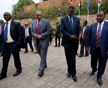 L-R: Uganda Chief of Defence Forces, Gen. Edward Katumba Wamala, Chief of Defence Staff of Rwanda Defence Forces Gen. Patrick Nyamvumba, Rwandan Defence minister James Kabarebe and....