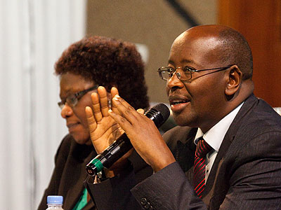 State Minister in charge of Social Welfare Alvera Mukabaramba (L) with Minister James Musoni, during the local leaders' meeting. (Timothy Kisambira)