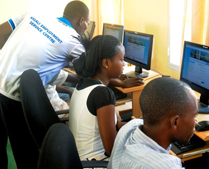 Youth at the Kigali Employment Service Centre try to connect for jobs. Timothy Kisambira.