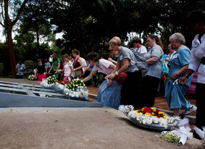 Some of the visiting Americans pay respects to Genocide victims at Kigali Memorial Centre yesterday. Timothy Kisambira.