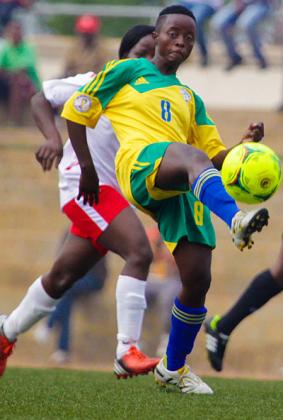 She-Amavubi star striker Shadia Uwamahirwe controls the ball during the first leg of the first round qualifier against Kenya. Timothy Kisambira.
