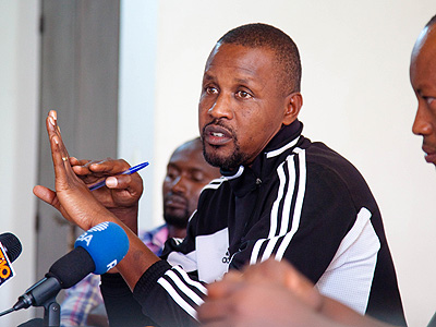 Amavubi assistant coach Andre Cassa Mbungo speaking during  yesterday's news briefing held at Ferwafa headquarters in Remera. (Timothy Kisambira)