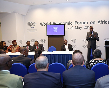 President Kagame speaks on topic, u2018Free to Travelu2019, at the World Economic Forum on Africa in Abuja, Nigeria, yesterday.  The topic also had panelists, seated from the right, AfDB president Donald Kaberuka, Kenyan President Uhuru Kenyatta, Aliko Dangote, a Nigerian business magnate, and Malian Prime Minister Moussa Mara. (Village Urugwiro)