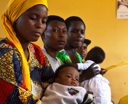 Mothers await medical service at a health centre in Kigali. Rwanda has hit the MDG target on maternal health. File.