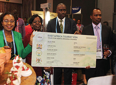 Ugandau2019s tourism minister Maria Mutagambwa (second left) joins officials from Rwanda and Kenya at the launch of the new visa in Durban, S.Africa. The New Times / P. Tumwebaze