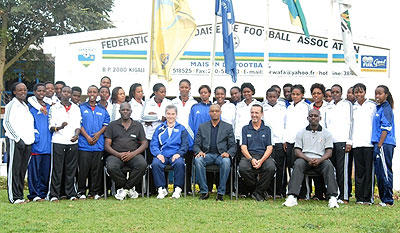 Women coaches attending the training course pose for a photo with Ferwafa and Fifa officials on Monday at ferwafa headquarters. Courtesy