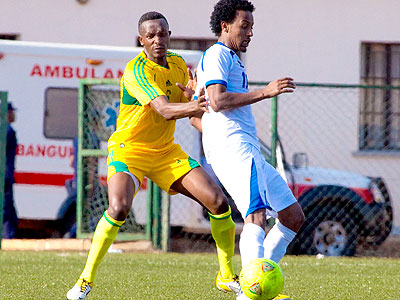 Defender James Tubane (L) seen in a previous competition with AS Kigali, will be in charge of central defense alongside Emery Bayisenge when Rwanda takes on Libya in Tunisia on Sunday. (Timothy Kisambira)