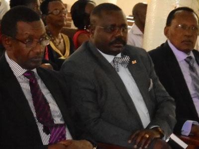 Mugambage (L), Oulanya (C) during the memorial service. (Gashegu Muramira)