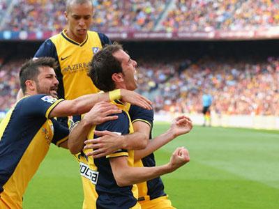 Diego Godin celebrates netting the crucial equaliser for Atletico Madrid. (Internet photo)