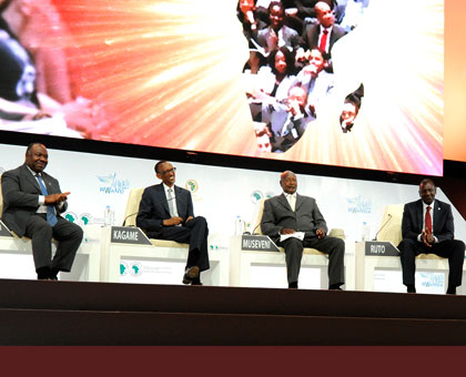 A panel of Heads of State dialogue with the delegates on issues partaining to Africau2019s transformation at the AfDB meeting in Kigali yesterday. From L-R;  Presidents Ondimba, Kagame and Museveni, and Kenyan Deputy President William Ruto.   Village Urugwiro.