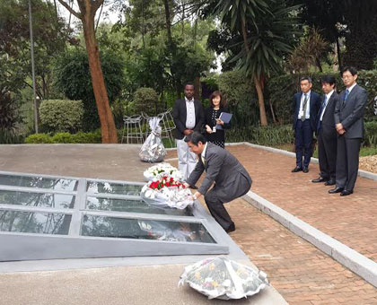 Yamamoto, Japanese deputy finance minister lays a wreath on the Kigali Genocide memorial site. Ivan Ngoboka. 