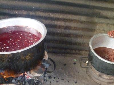 Beans being prepared in one of the slums. (Su00e9raphine Habimana)