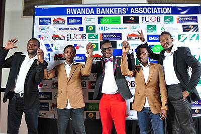 Kesho band members salute the audience while holding hands. Sarah Kwihangana