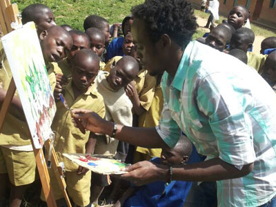 Buregeya educates children about the environment through painting. (Courtesy)