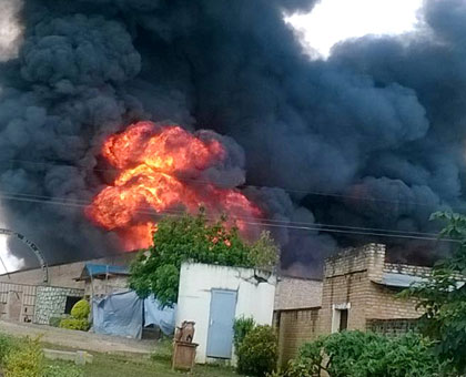 A thick plume of smoke engulfs Muhanga Prison yesterday as a rare fire gutted the correctional facility. (Jean-Pierre Bucyengenge)
