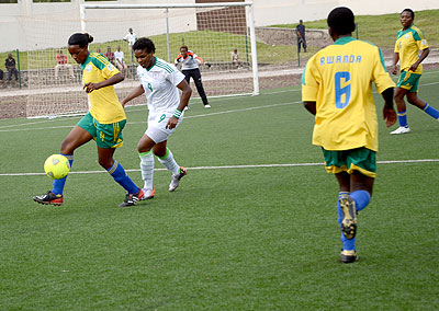 She-Amavubi defender Edith Umulisa runs away from Super Falcon's striker Desire Oparanozie during the first leg clash at Umuganda stadium two weeks ago. S. Ngendahimana