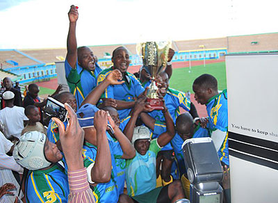 Silverbacks players celebrate after winning the 2014 CAR Div.2 qualifiying tournament. Courtesy