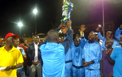 Police handball club celebrate their Cup victory on Sunday.  P. Kabeera.