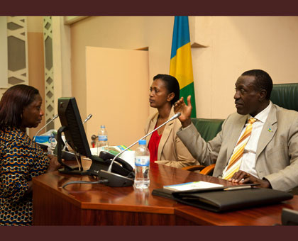 Dr Alvera Mukabaramba (L), listens to Senate President Jean Damascene Ntawukuliryayo as Senate Deputy President Jeanne du2019Arc Gakuba looks on. T. Kisambira.
