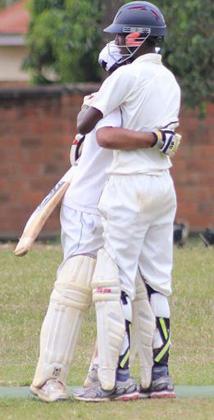 Eric Ndangamyambi being congratulated.