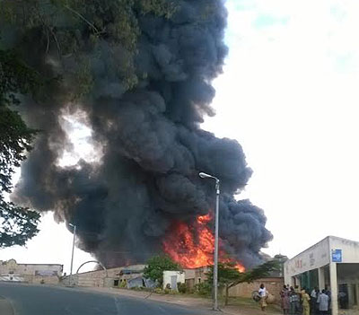 A huge black plume of smoke billowing over the prison. courtesy.  