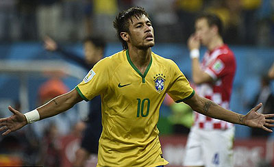Neymar the Redeemer: Brazil's No 10 strikes a pose after his second goal