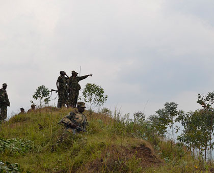 Some of the RDF soldiers patrolling the scene of  battle. Jean du2019Amour Mbonyinshuti. 