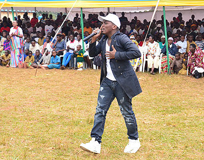 Tom Close entertaining residents of Gisagara during the World Blood Donor day celebrations. Sarah Kwihangana