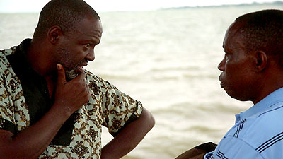 Jean Paul Samputu with Yves Montand Niyomugabo on the set