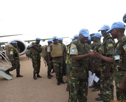 Rwandan peacekeepers are welcomed by their compatriots upon arrival at Malakal Airport in South Sudan, from Darfur in Sudan, on June 9. Courtesy. 