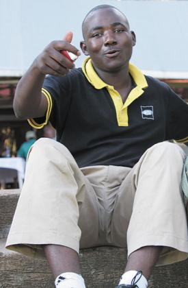 Jean Baptiste Hakizimana relaxes after a training session at Kigali golf club. File Photo