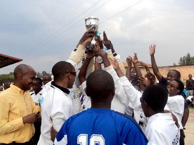 Jubilant HVP Gatagara players and offcials celebrate after winning the 2014 Goal ball national championship. (Vital Muhirwa)