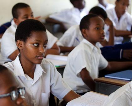 Students of IFAK Senior School in class. Some children drop out of school for casual labour. (Timothy Kisambira)