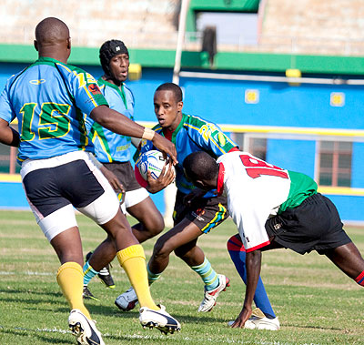 Marcel Koko (with the ball), seen here in action against Burundi during the CAR Div. 2 qualifiers, scored the first try for Rwanda. T. Kisambira.