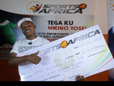 All Smiles-Jean Claude Gatoya Munyakazi, the LPS sports betting winner of Rwf156,788,830, the largest amount in Rwanda's history. Courtesy