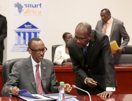 President Kagame is consulted during Smart Africa Alliance board meeting in Malabo yesterday. Village Urugwiro