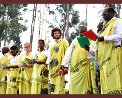 South Sudan foreign affairs minister Barnaba Marial Benjamin (R) was the first foreign guest to name a baby gorilla yesterday. John Mbanda.