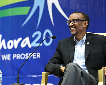 President Kagame in a light moment during the Pan African Youth Conference in Kigali yesterday. The President urged African youth to shake off low expectations and believe in their abilities to transform the continent. (Village Urugwiro)