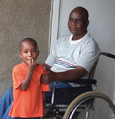 Although he is confined to a wheelchair, Twagiramungu says he is proud for having participated in the struggle to liberate Rwanda from fascist and genocidal regimes. / JP. Bucyensenge.